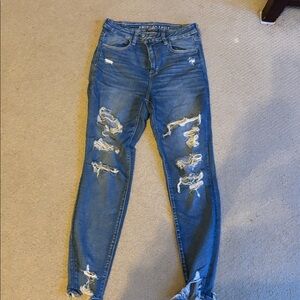 Ripped Blue Jeans curvy high rise